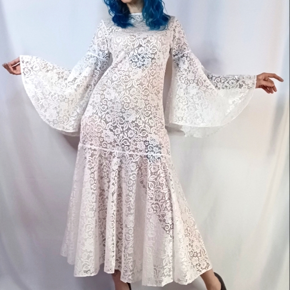 White Floral Stretch Lace Maxi Dress with Angled Flounce Sleeves.